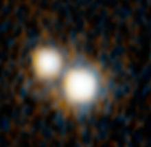 two pairs of quasars that existed 10 billion years ago and reside at the hearts of merging galaxies.