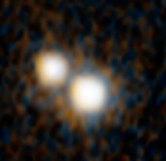 Dwie pary kwazarów, które istniały 10 miliardów lat temu i znajdują się w sercach łączących się galaktyk. Credit: NASA, ESA, H. Hwang and N. Zakamska (Johns Hopkins University), and Y. Shen (University of Illinois, Urbana-Champaign) two pairs of quasars that existed 10 billion years ago and reside at the hearts of merging galaxies.